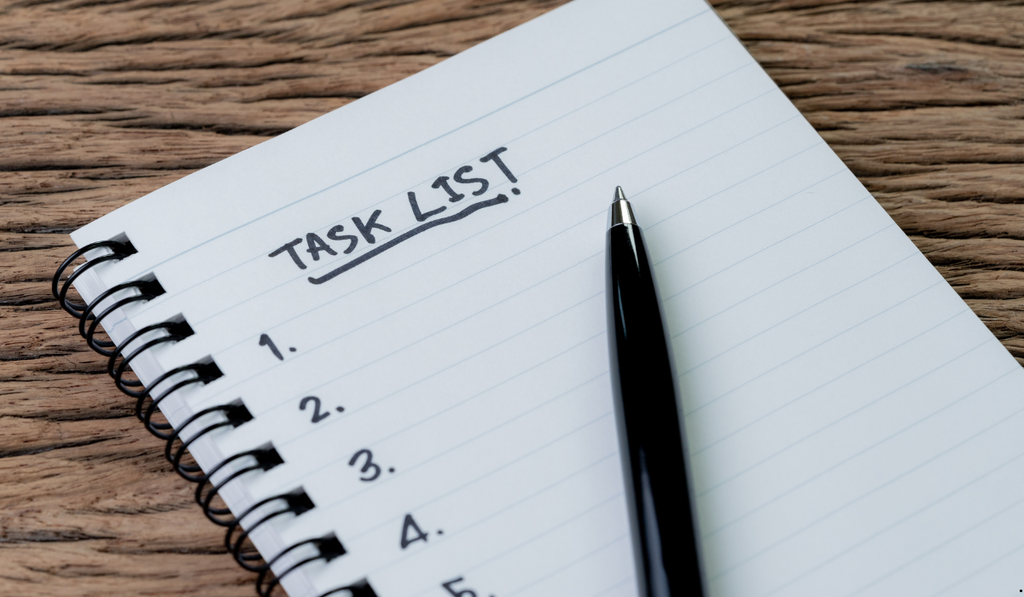 Task list and pen illustrating how the MODAPTS work-measurement system breaks manual work into measurable activities for standardized time analysis.