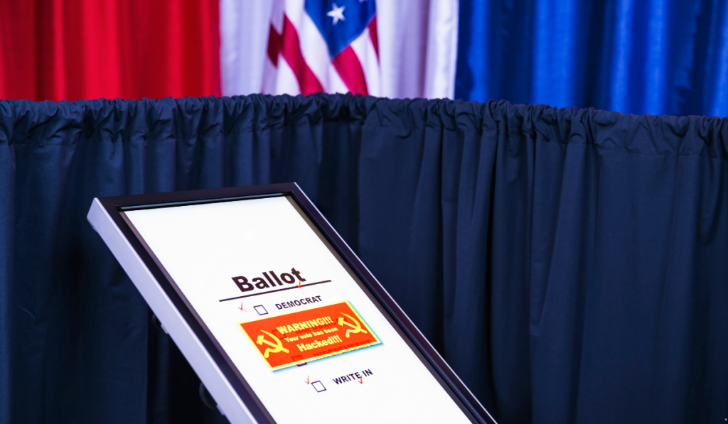 Electronic voting machine displaying a ballot screen with a cybersecurity warning, illustrating EVM security and election technology.