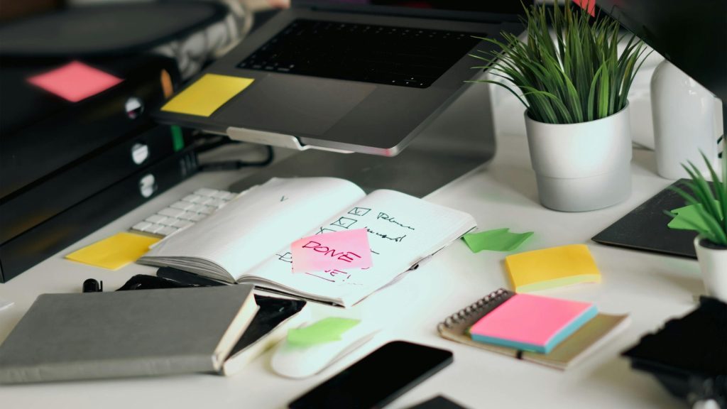 Organized workspace illustrating Benefit Effort Matrix planning with notes, checklists, and task prioritization for process improvement initiatives.