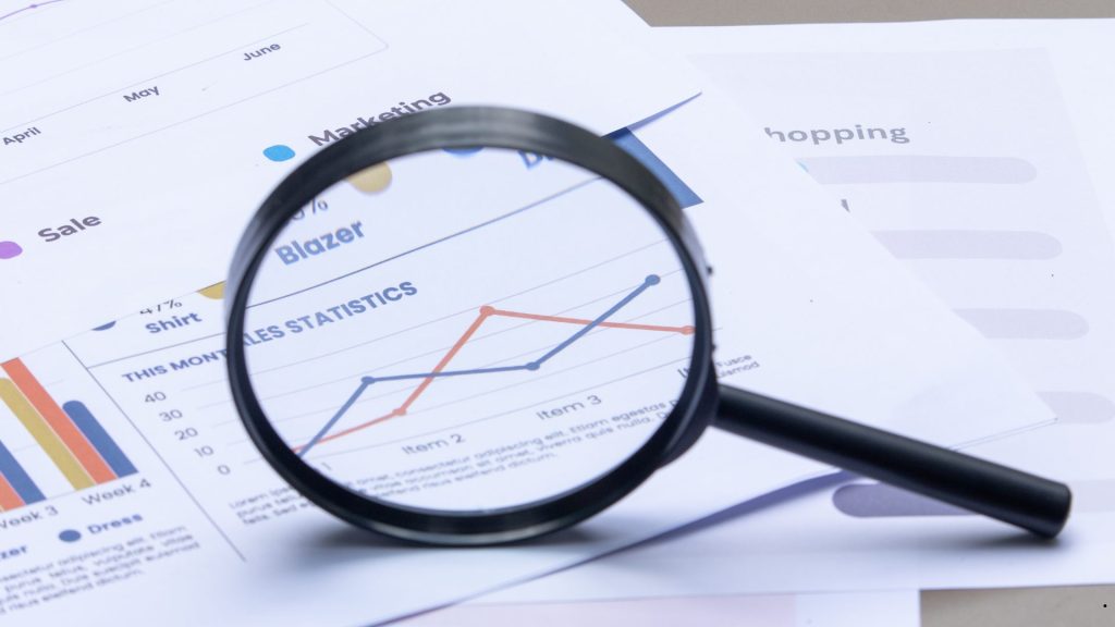 Skewed Right vs Skewed Left statistical analysis illustrated with sales charts and trend data used to compare distribution shapes and data skewness.