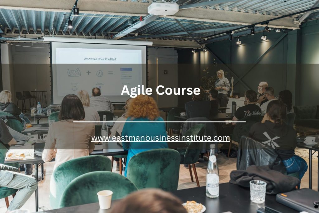 Audience attending an agile course workshop and presentation focused on agile methodologies and team collaboration.