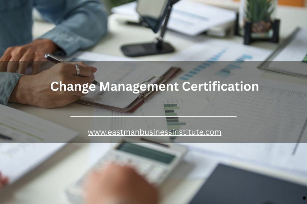 Change management certification promotional banner featuring business analysis documents and workplace planning materials.