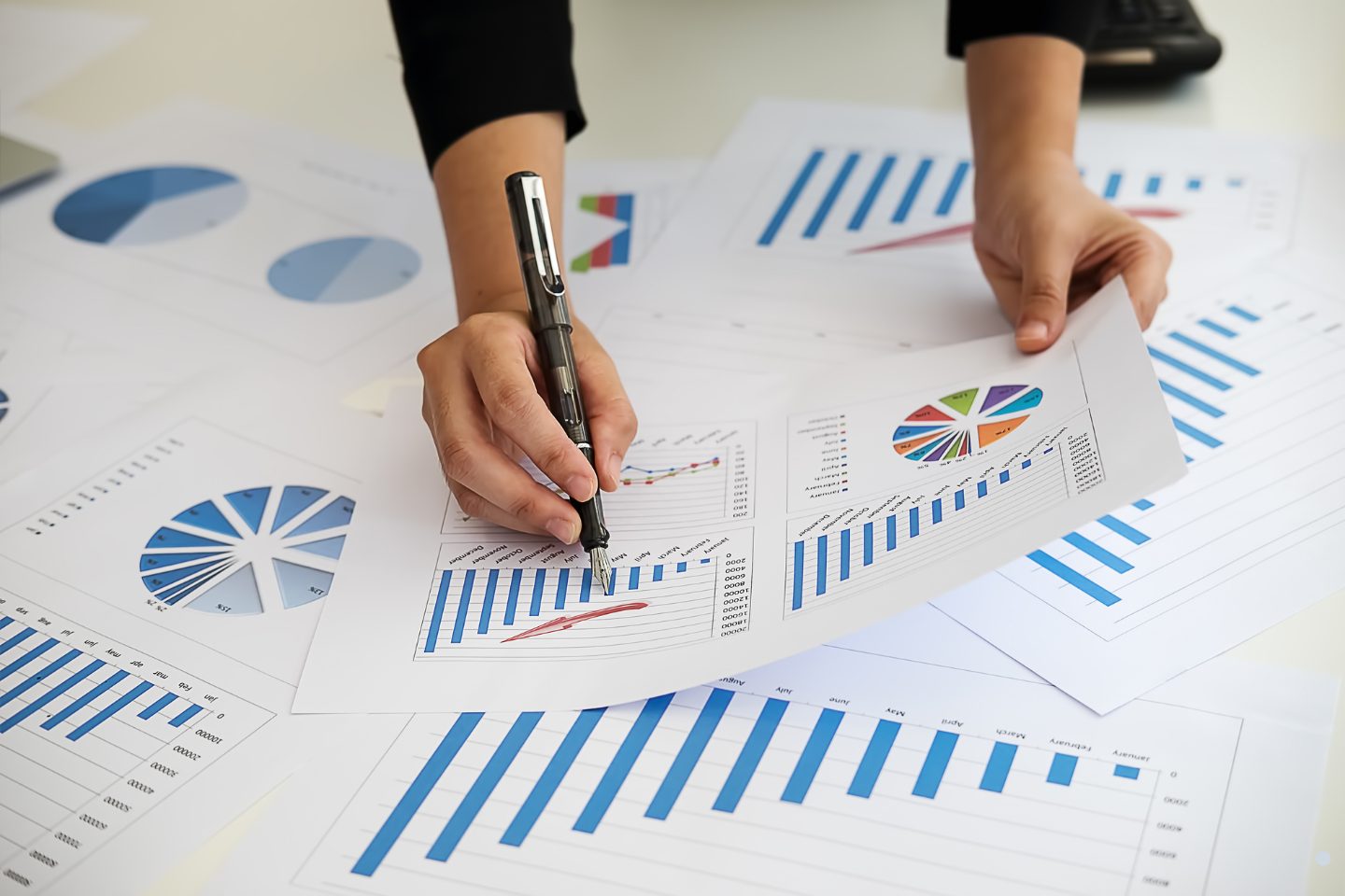 Lean process improvement analysis showing business performance charts and data-driven operational efficiency planning.