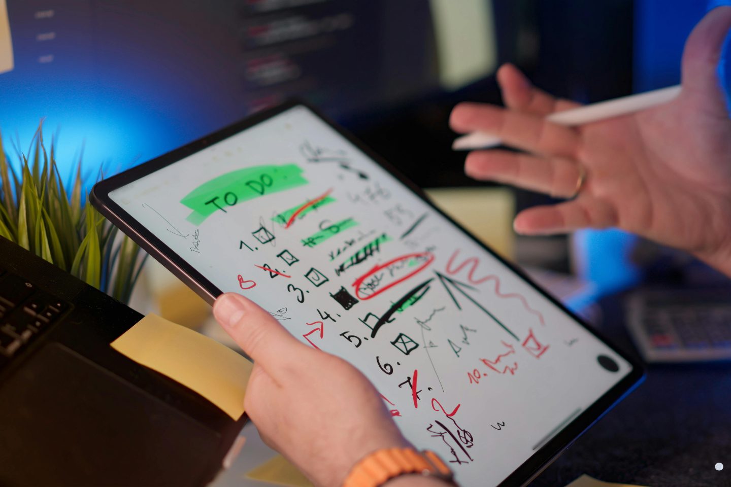 Digital task checklist and workflow planning on a tablet representing organization and tracking in the Phases of Project Management process.