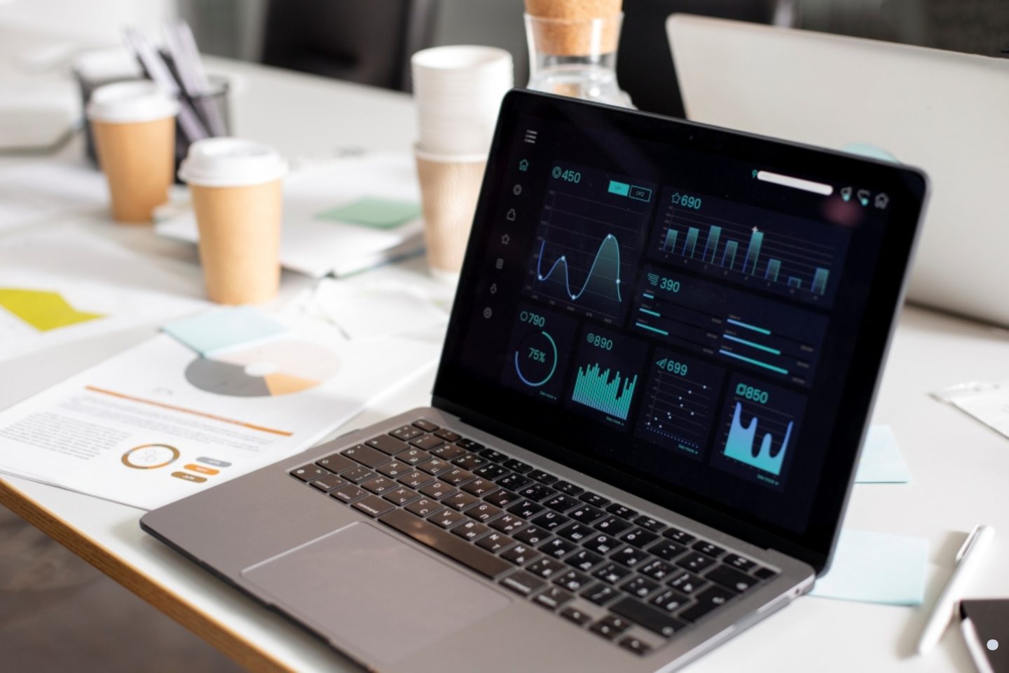 Problem solving process dashboard displayed on a laptop with business analytics and performance tracking metrics.