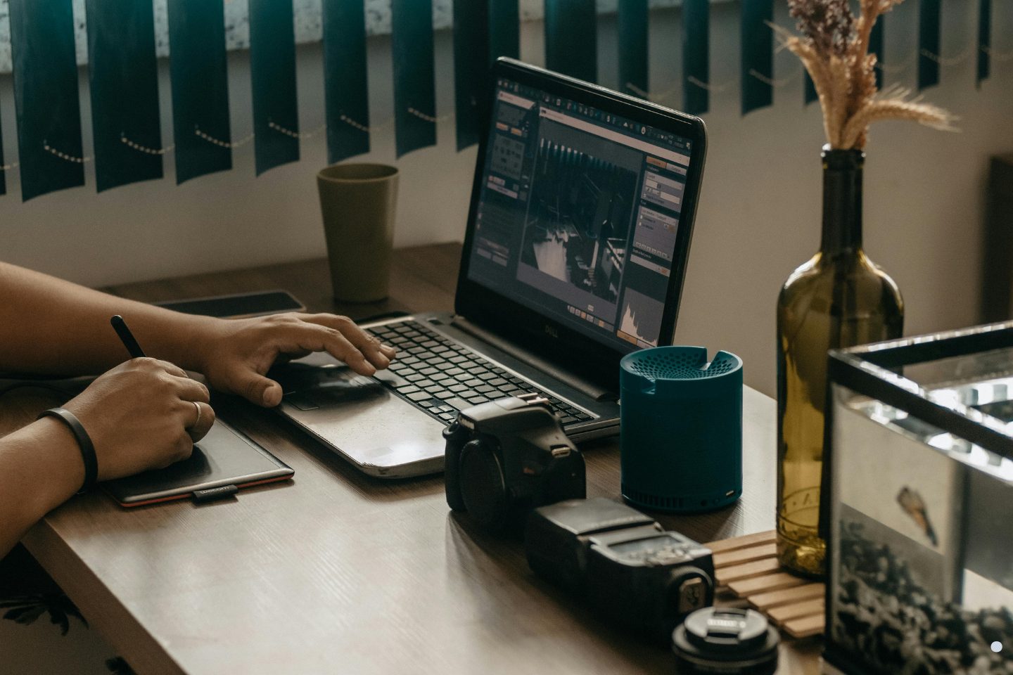 Project Charter Six Sigma professional reviewing business analytics and project performance reports on a laptop workspace.