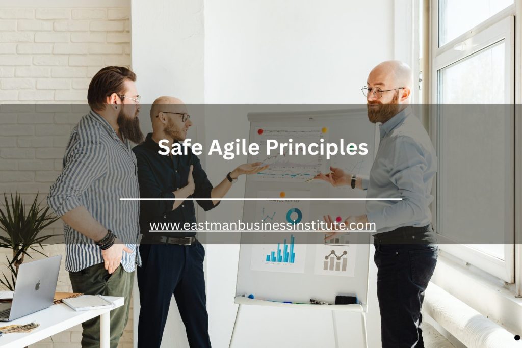 Business professionals presenting charts beside a whiteboard with “Safe Agile Principles” text overlay for the safe agile principles topic.