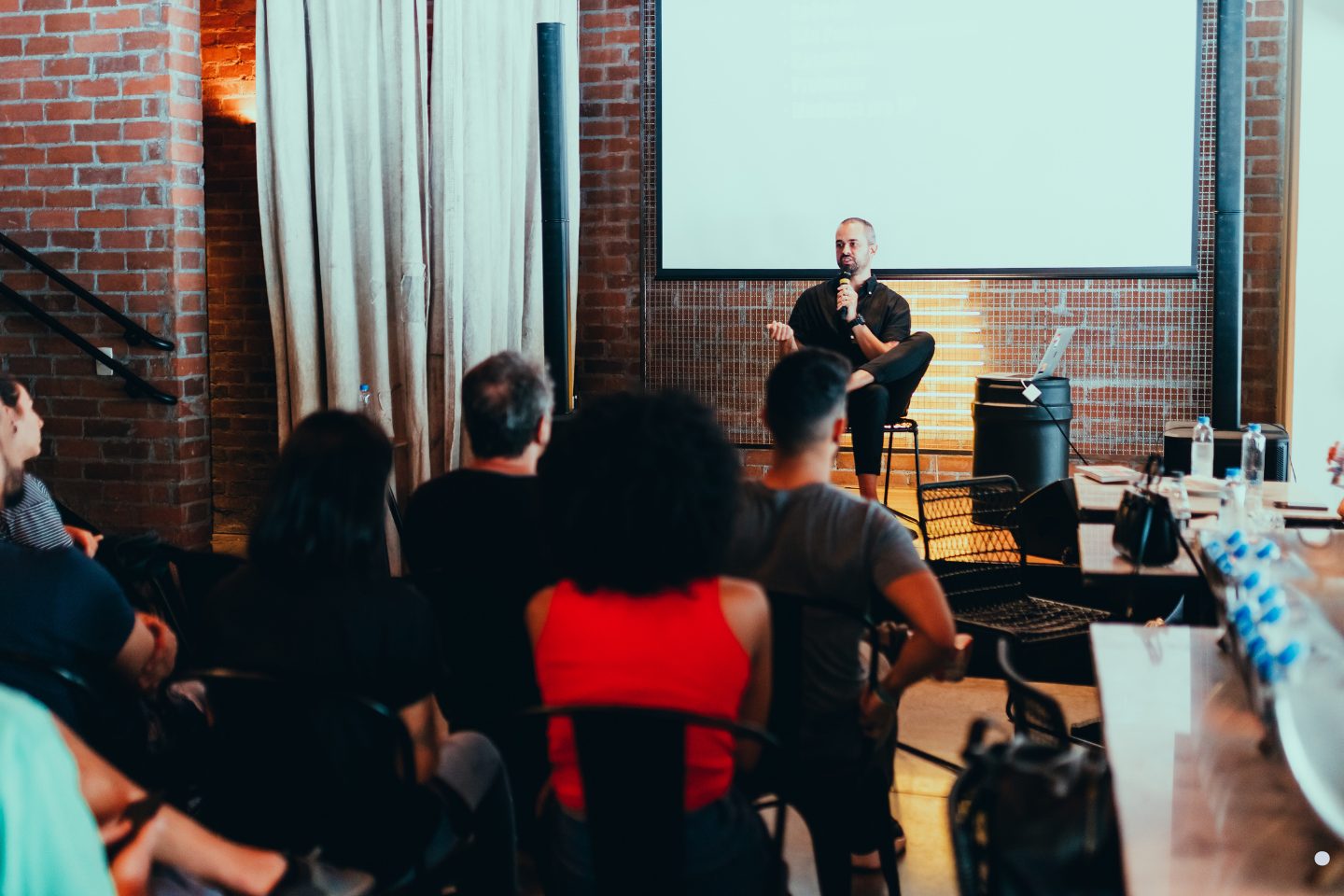Instructor leading a professional Six Sigma Green Belt Training session focused on process improvement and team collaboration.