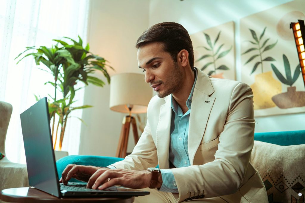 Turnaround time professional working remotely on a laptop to improve productivity and task completion efficiency.