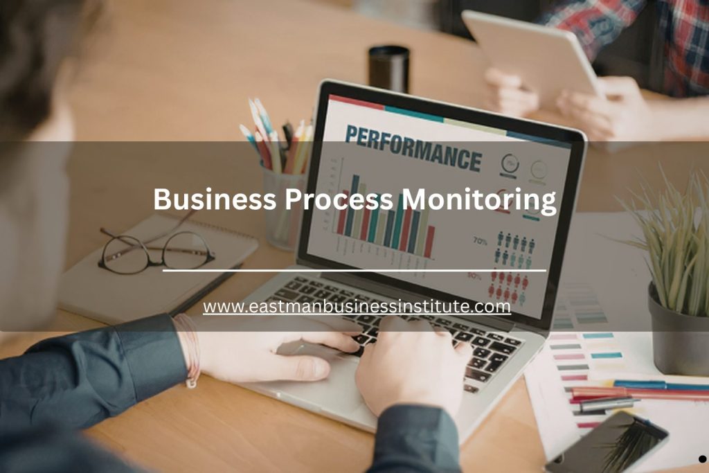Laptop displaying performance analytics dashboard with charts and office workspace setup