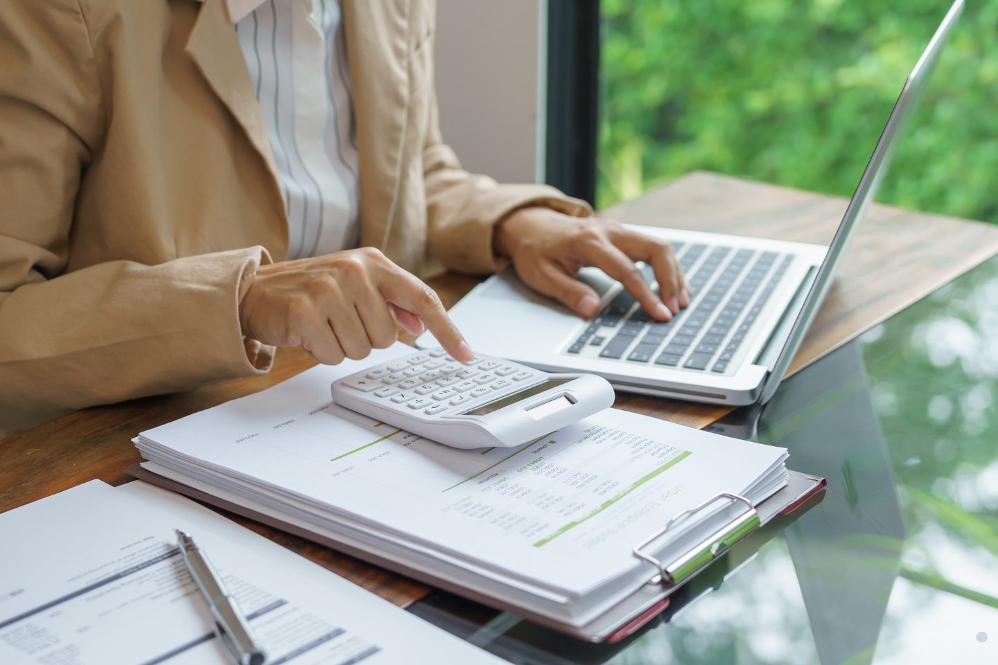 Professional tracking project expenses and financial documents for efficient cost management in project management.