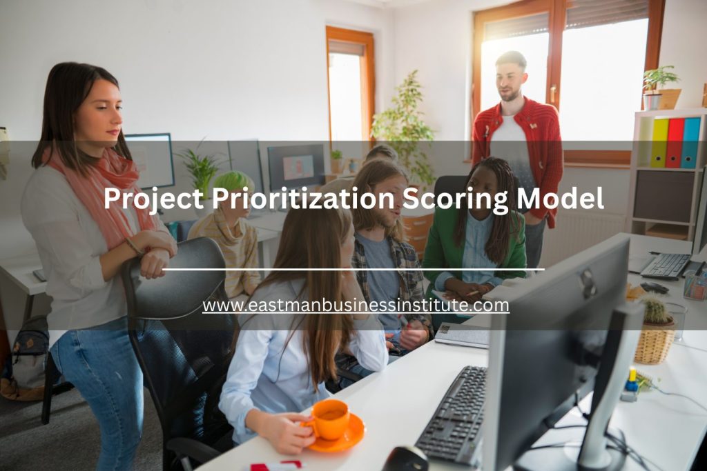 Office team meeting to discuss project prioritization scoring and business planning around desktop computers.