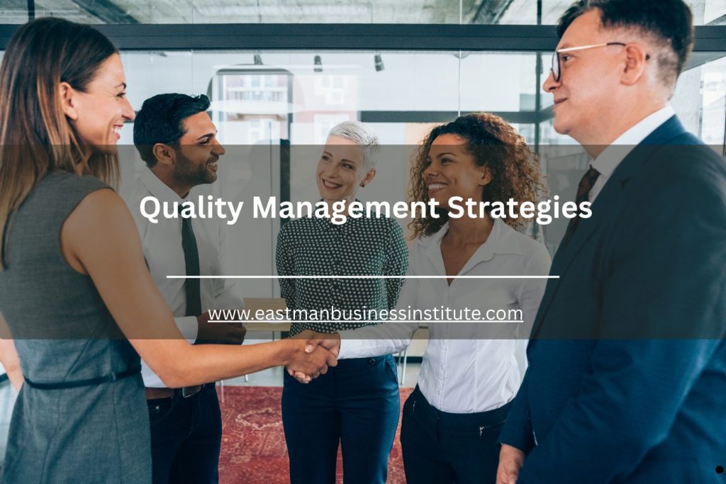 Business professionals shaking hands in an office, representing partnership and quality management strategies.