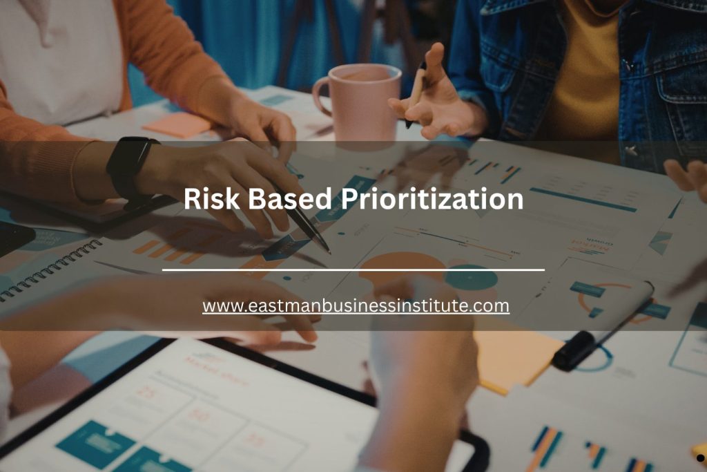 Team reviewing charts and reports during a business meeting focused on risk based prioritization and strategic planning.